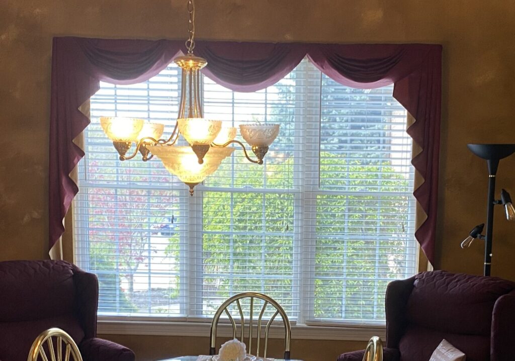 We will add light airy window treatments for this farmhouse dining room.